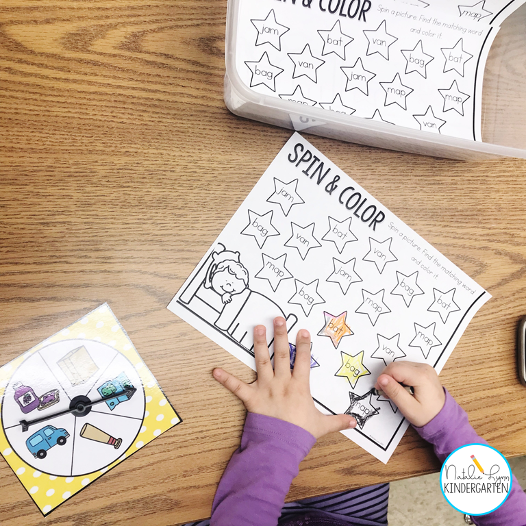How to run literacy centers in kindergarten with student choice - student practicing cvc words