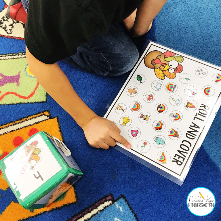 How to run literacy centers in kindergarten with student choice - Student working at centers