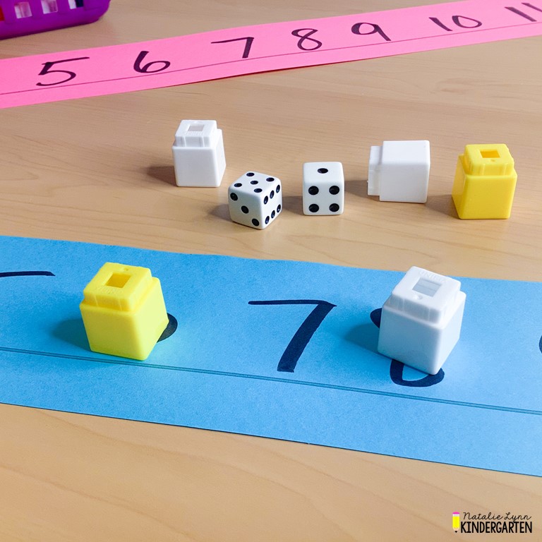 addition math game with a number line and dice for kindergarten