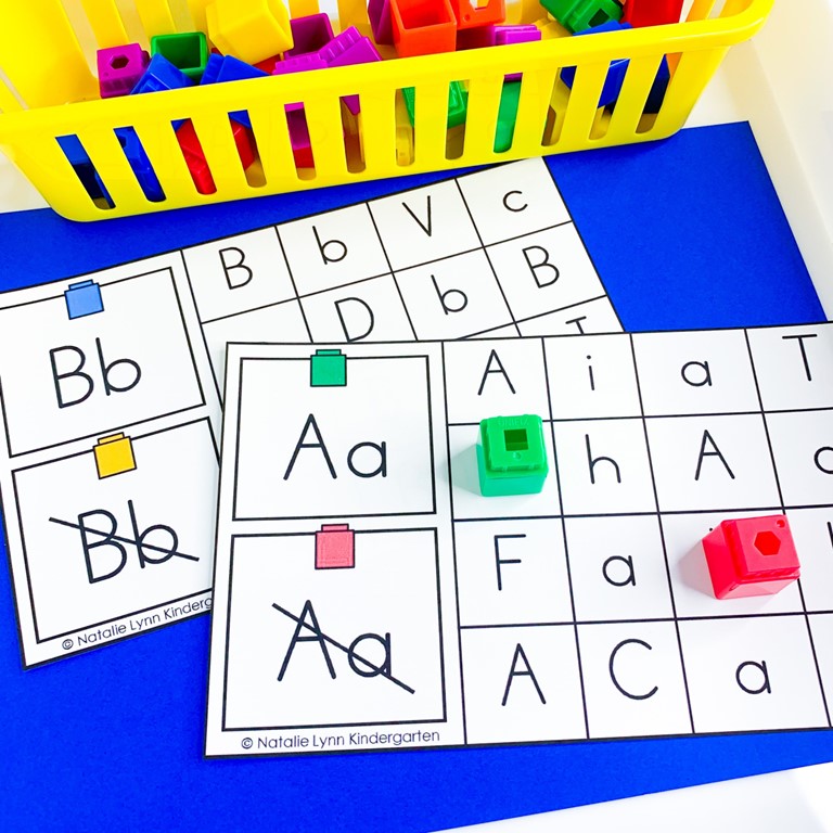 science of reading alphabet literacy centers | image shows a cover by code card for the letter Aa and not the letter Aa
