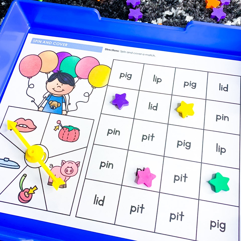 Free 100th Day of school Activities| Image shows a spin and cover center for the words lip, pin, pig, lid, pit
