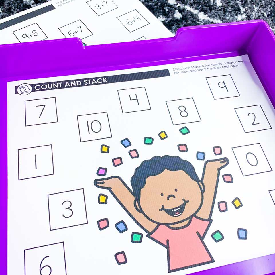 Kindergarten New Years Centers | image shows a count and stack mat with numbers to 10 on a purple tray