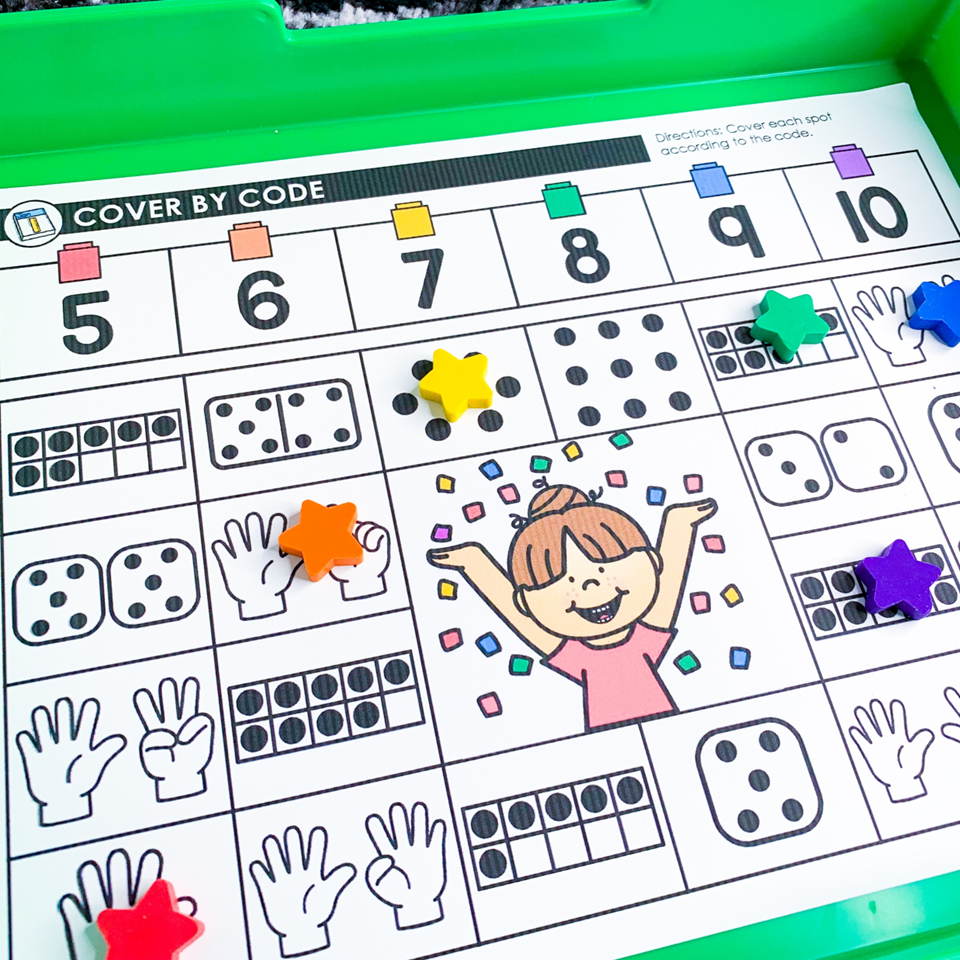 New Years Centers for Kindergarten | Image shows a number sense cover by code mat for numbers 5-10